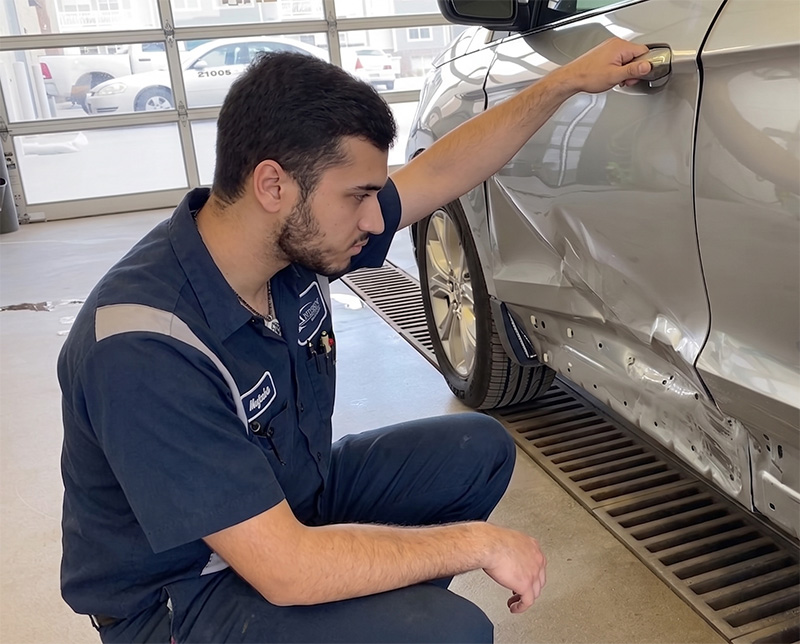 Vehicle undergoing collision repair in St. Joseph, Missouri